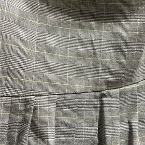 Giorgio Fiorelli Classic Gray Stripped Pencil Skirt with pleated hem in front.